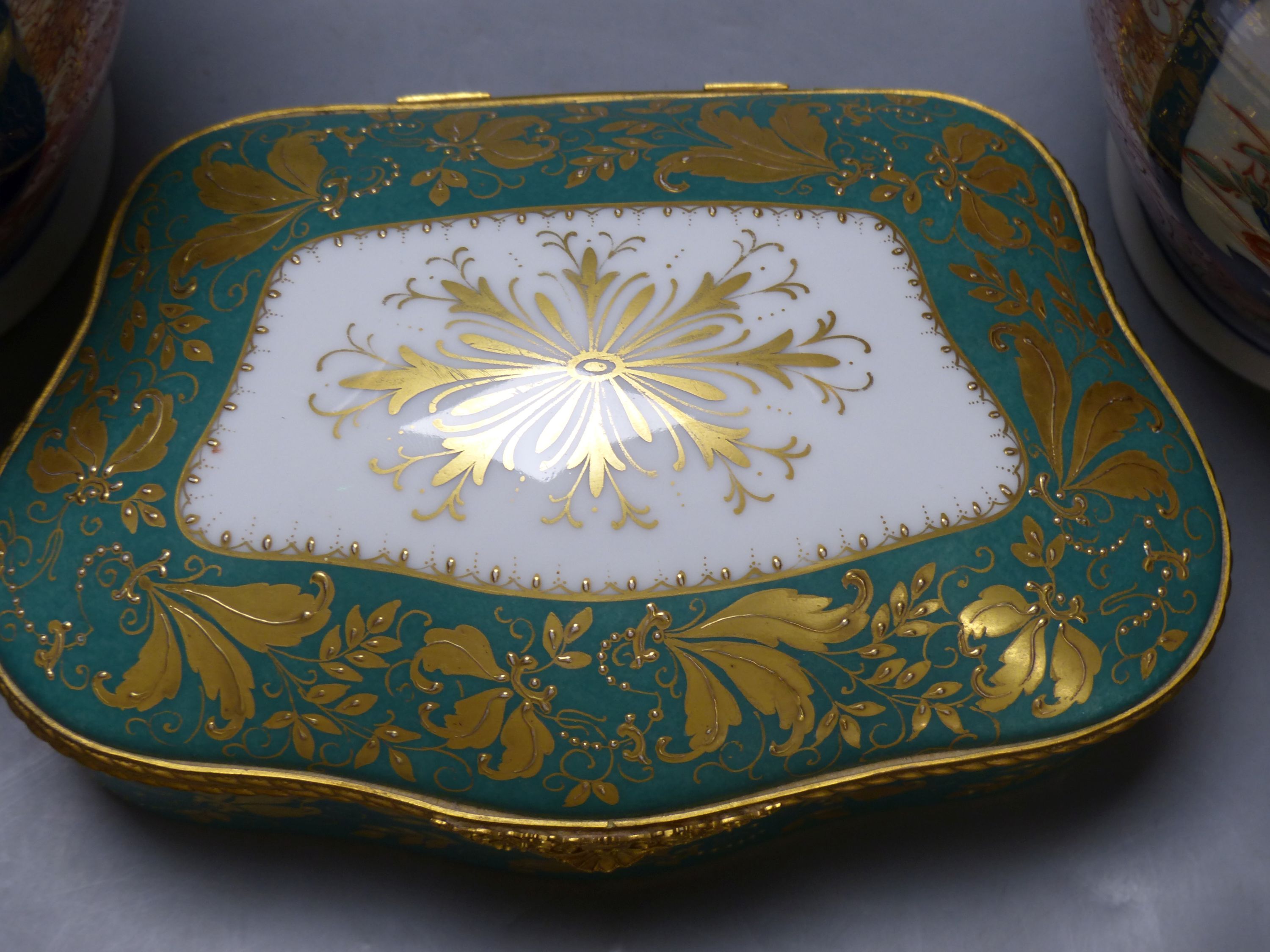 A pair of Imari vases and covers and a Limoges box, height 30cm